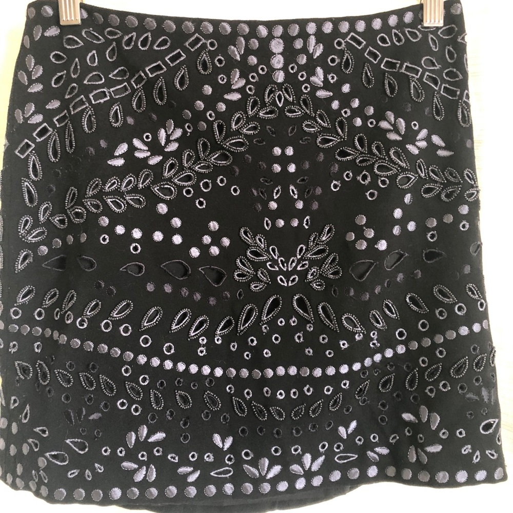 Navy beaded skirt with cut out design.